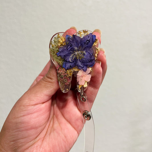 Purple Flower Tooth Badge Reel
